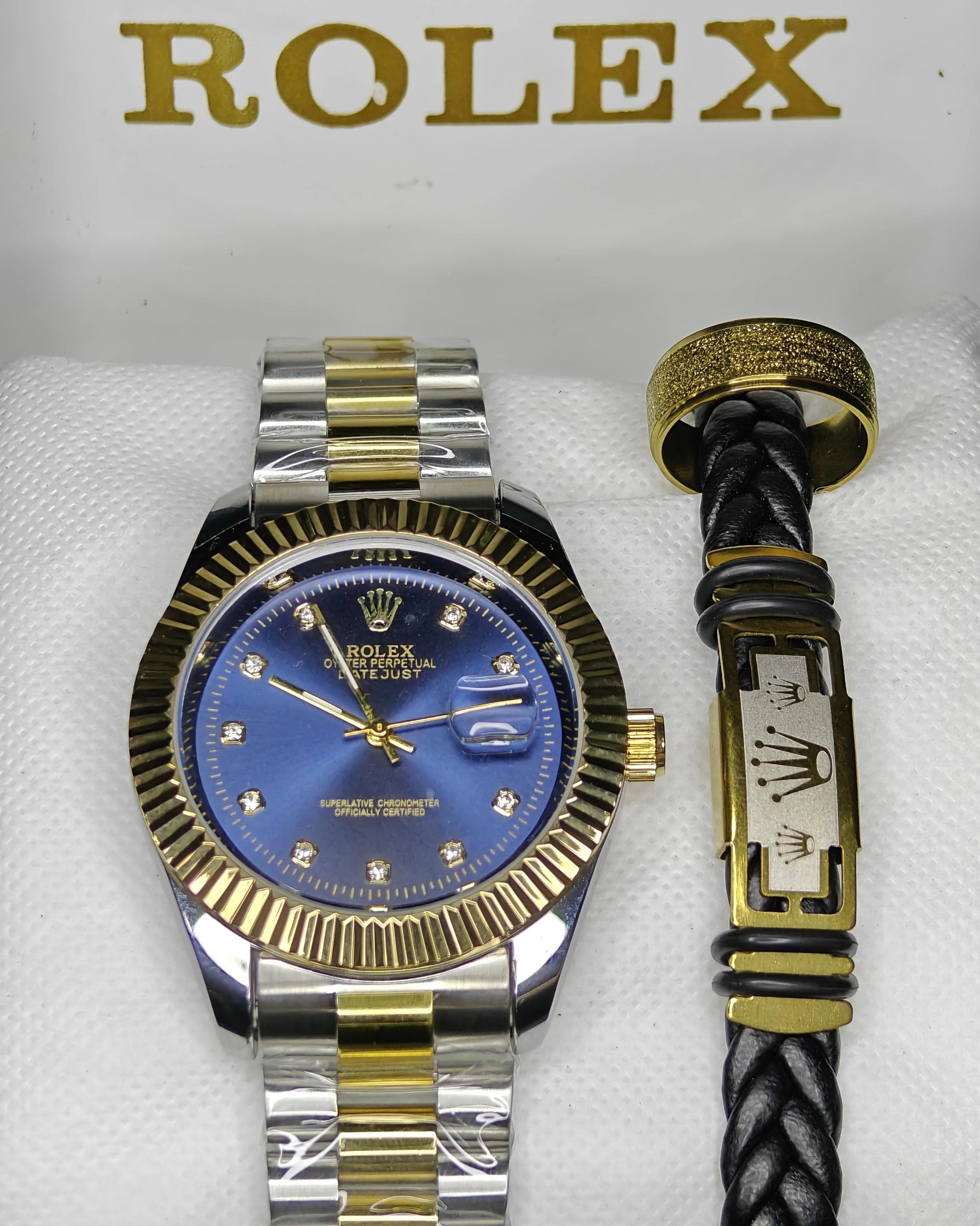 Rolex watch and bracelet set on a white background with Rolex logo.